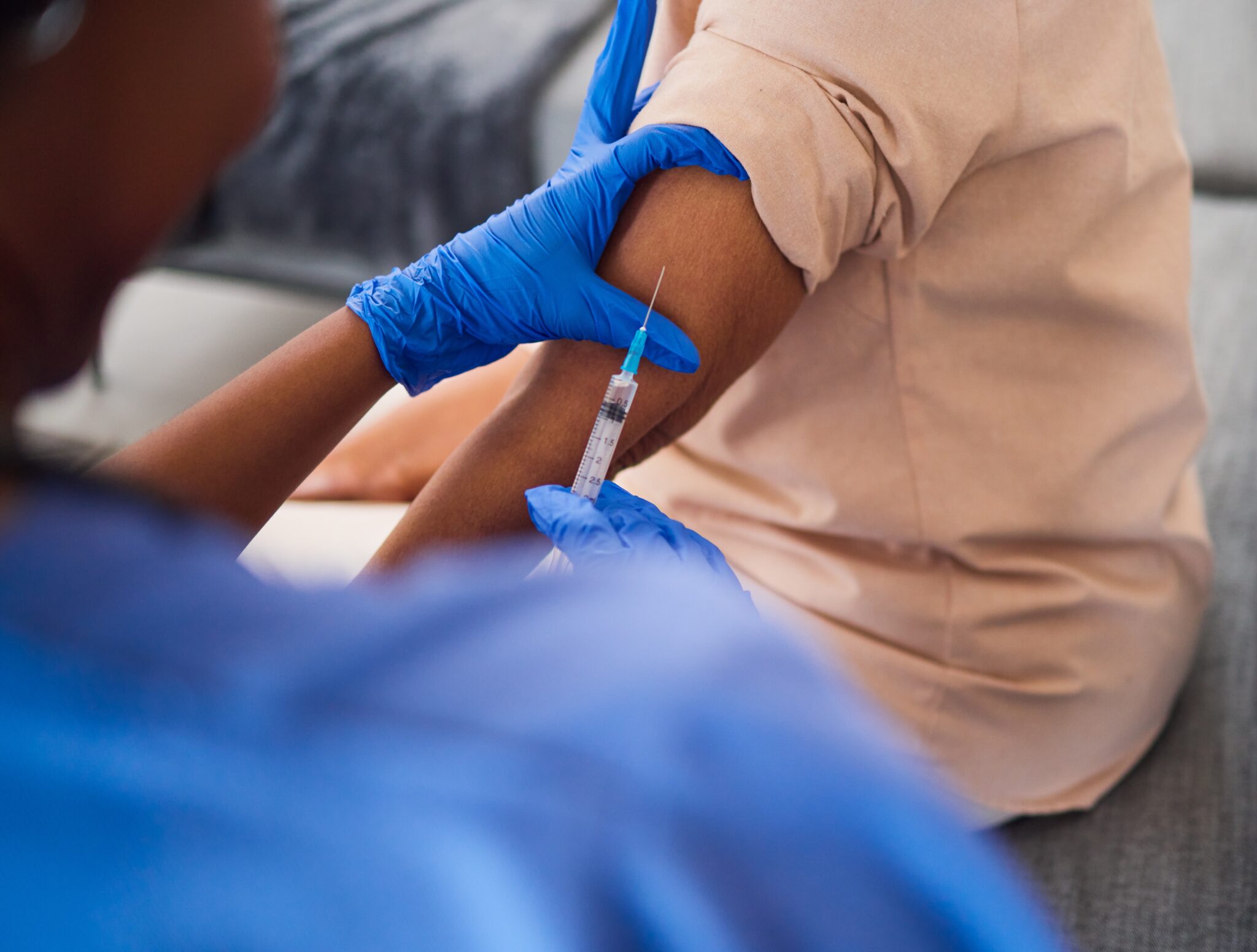 Vitamin injection being administered by a qualified nurse at Wellness Wave IV clinic in the UK